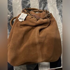 Brown suede ring bucket bag from Urban Outfitters